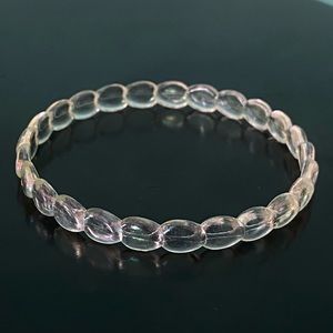 Clear bangle with purple shine